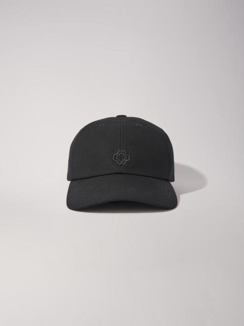 Cotton cap with gold-tone buckle