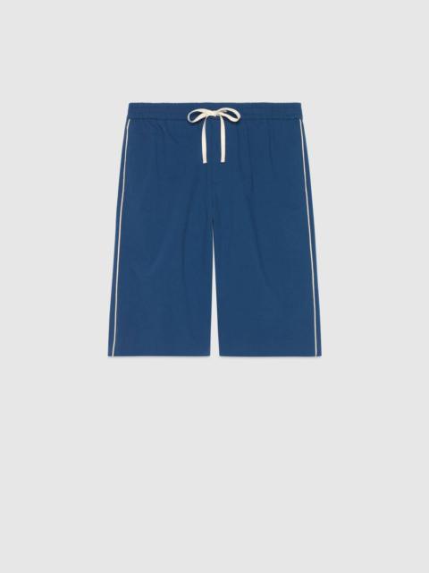 GUCCI Gucci logo print cotton nylon shorts