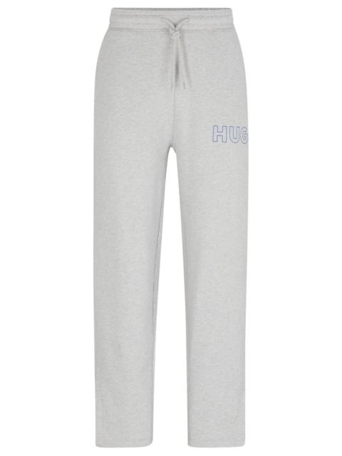 HUGO LOOSE-FIT COTTON-TERRY TRACKSUIT BOTTOMS WITH OUTLINE LOGO