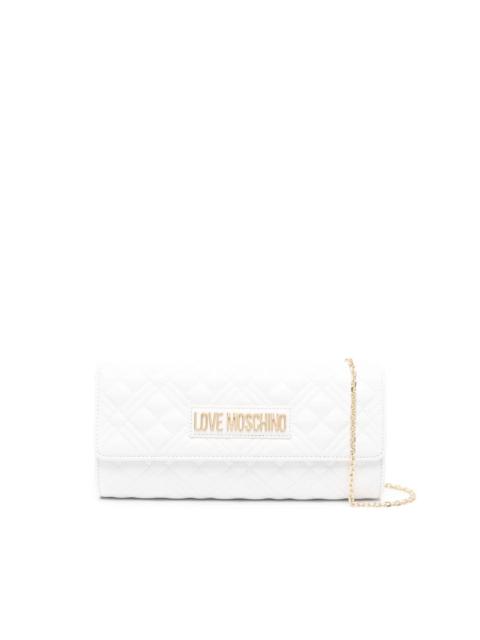 Moschino logo-lettering quilted clutch bag