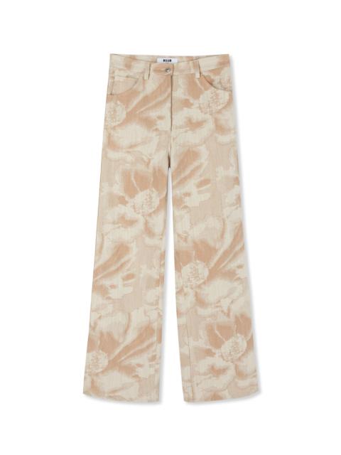 Jacquard fabric pants with 5 pockets and large daisy design