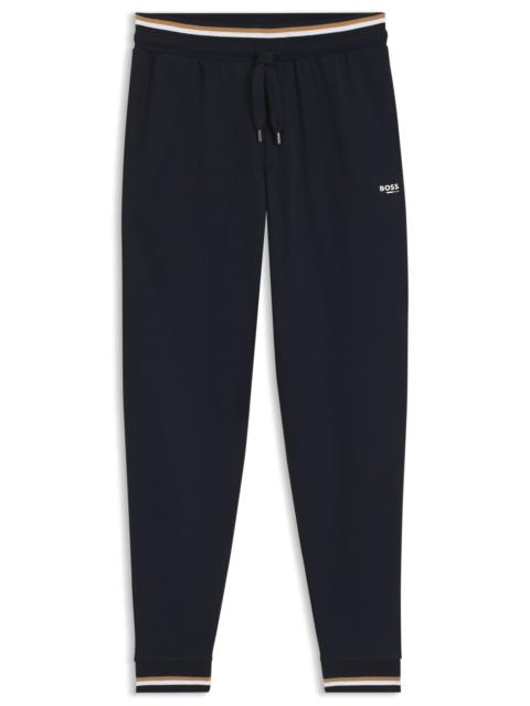 BOSS COTTON-TERRY TRACKSUIT BOTTOMS WITH SIGNATURE STRIPES AND LOGO