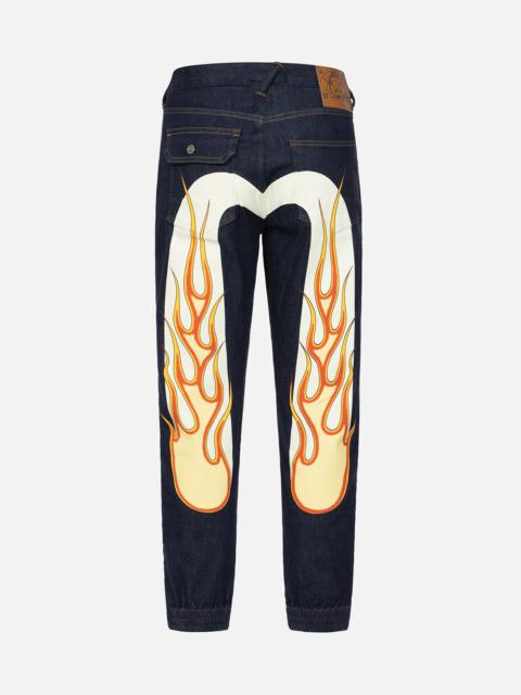 EVISU FLAME DAICOCK PRINT SIDE ZIPPED DENIM JOGGER PANTS