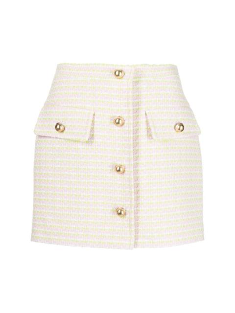pushBUTTON button-up mini skirt