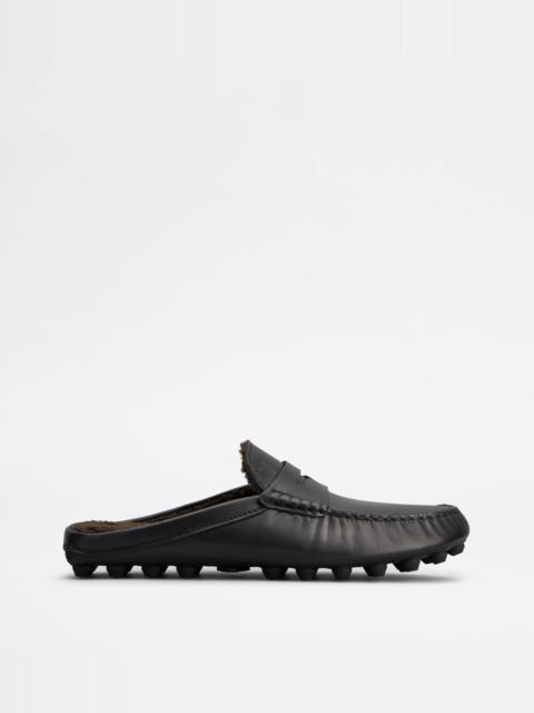 Tod's GOMMINO BUBBLE MULES IN LEATHER - FURRY LINING - BLACK