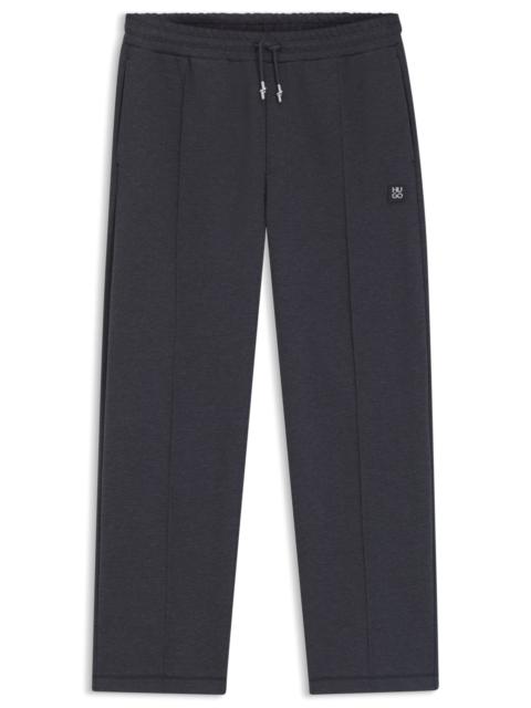 HUGO PINTUCK-PLEAT TRACKSUIT BOTTOMS IN A RELAXED FIT