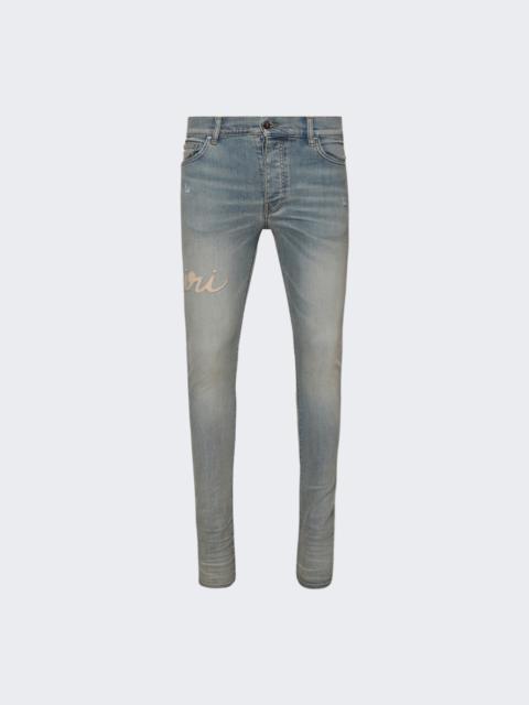 AMIRI Amiri Script Logo Skinny Jean Antique Indigo