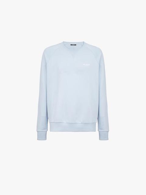 Balmain Pale blue eco-designed cotton sweatshirt with small flocked white Balmain Paris logo
