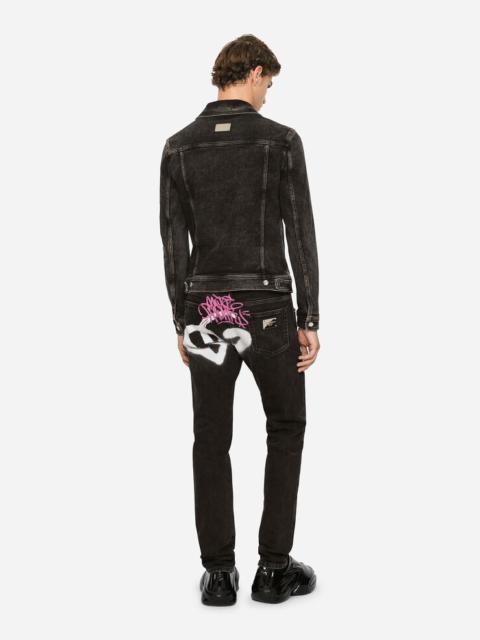 Dolce & Gabbana Black skinny jeans with spray-paint DG print