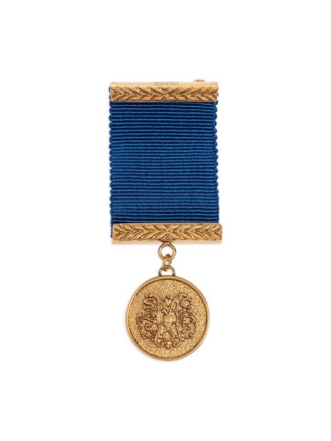 Moschino medal ribbon brooch