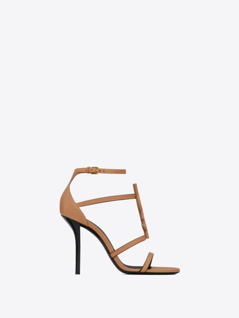 SAINT LAURENT cassandra sandals in vegetable-tanned leather with brown gold monogram