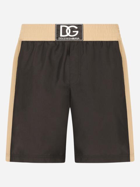 Dolce & Gabbana Two-tone mid-length swim trunks with DG patch