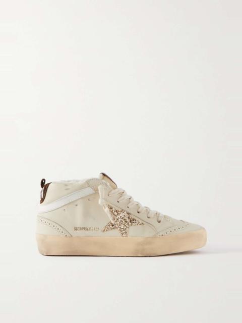 Superstar distressed shearling-lined rubber and leather sneakers