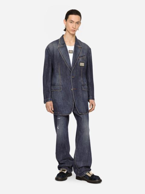 Deconstructed denim jacket with logo tag