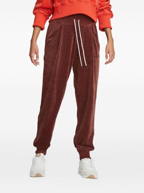 Nike elasticated-cuff high-waisted track pants