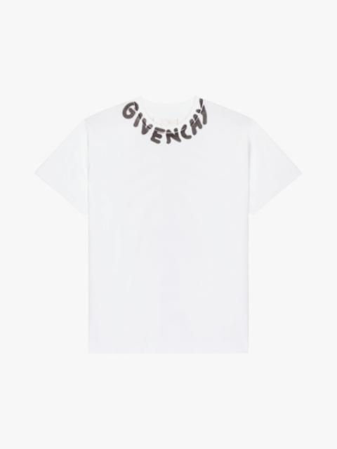 GIVENCHY OVERSIZED T-SHIRT WITH TAG EFFECT PRINTS