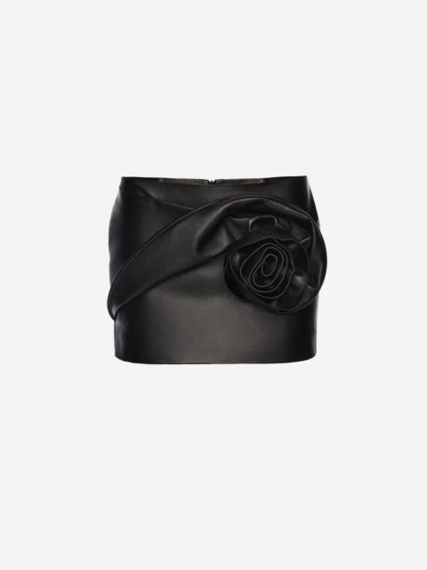 MAGDA BUTRYM Rose-detail leather mini skirt in black