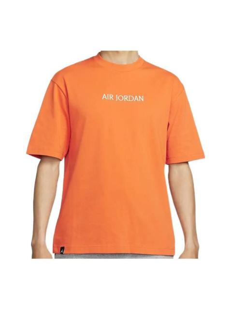 Jordan 남자의 공기 요르단 단단한 색깔 알파벳 로고 둥근 목 짧은 소매 오렌지 티셔츠 DO6100-847