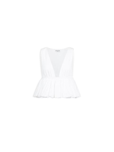 Alaïa OPENWORK COTTON PEPLUM TOP