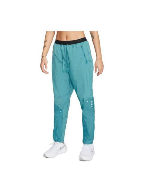 Nike (WMNS) Nike Therma-Fit Training Woven Trousers 'Teal' DX5554-440