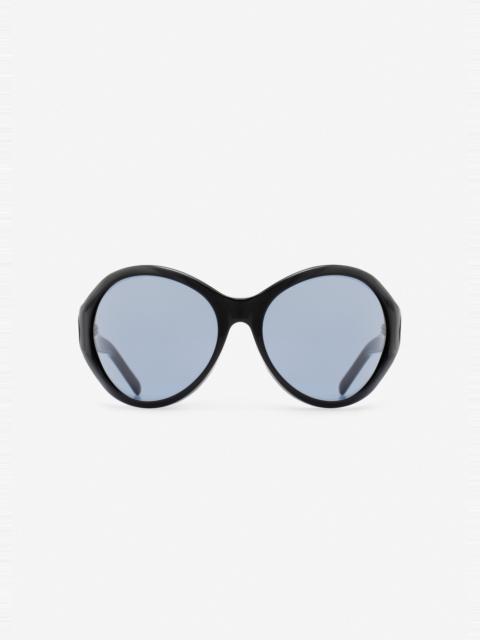 MAGDA BUTRYM Big round sunglasses in black with blue lenses