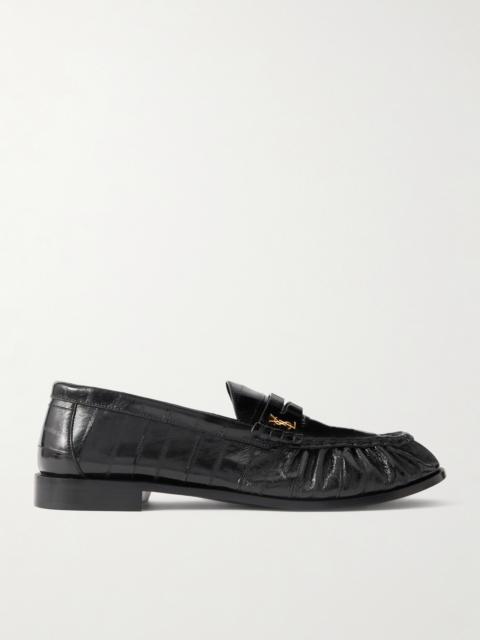 SAINT LAURENT Le Loafer Monogram Logo-Appliquéd Eel Penny Loafers
