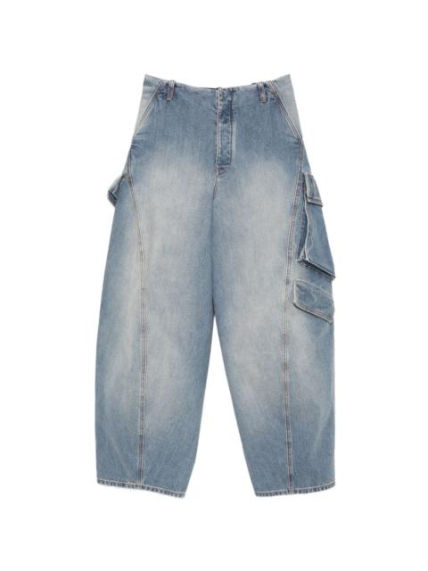 Alaïa faded-effect denim cargo pants