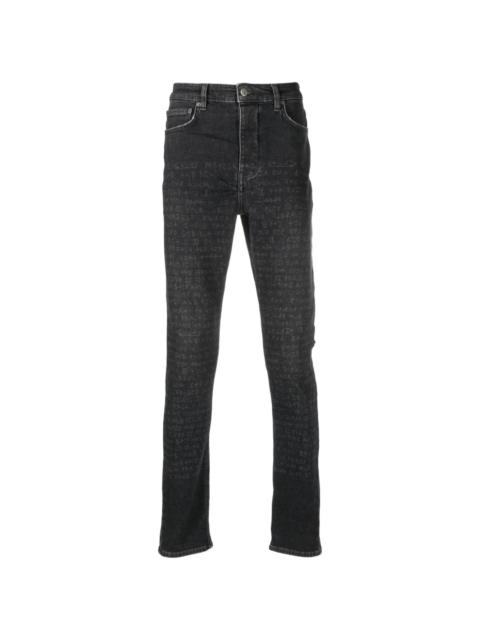text-print mid-rise tapered jeans