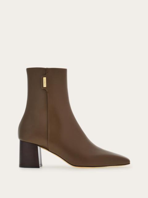 Ankle boot with golden tab