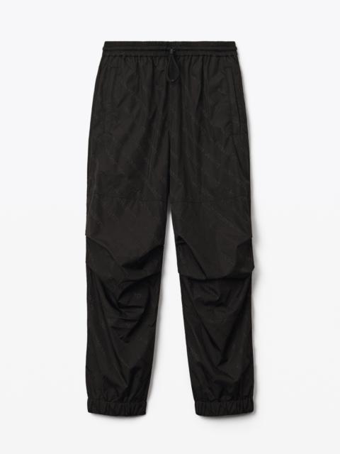 Alexander Wang TRACK PANT IN LOGO JACQUARD NYLON