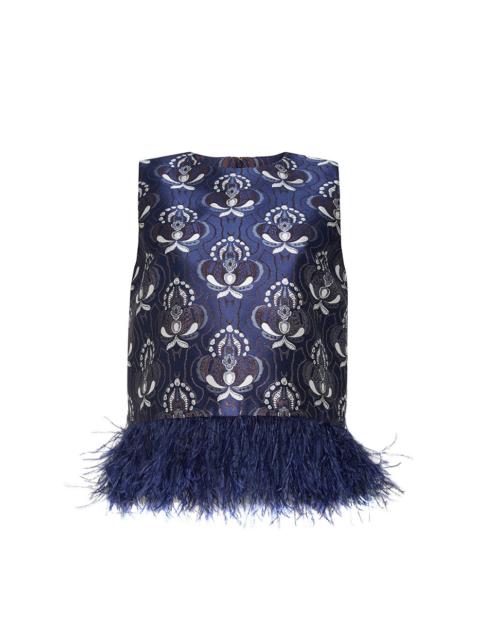 Cara Cara Belmond Top
The Feather Trim Adds Extravagance To This Fun Staple