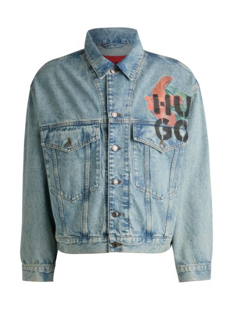 HUGO REGULAR-FIT JACKET IN RIGID DENIM WITH LOGO PRINTS