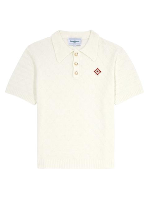 Bouclé-knit cotton-blend polo shirt