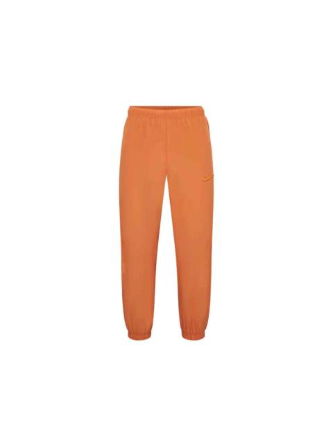 Nike x NOCTA Northstar Nylon Track Pants Hot Curry