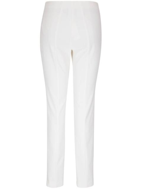 AKRIS exposed-seam slim-cut trousers