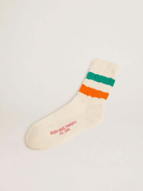 Distressed-finish white socks with green and orange stripes