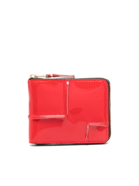 Comme Des Garçons exposed-seams zip-up wallet