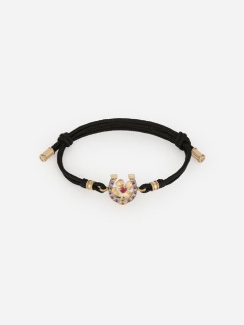Dolce & Gabbana Good Luck Bracelet fabric with a pendant in 18 carat yellow gold
