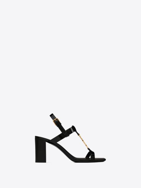 SAINT LAURENT cassandra heeled sandals in patent leather with gold-tone monogram