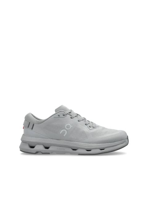 On logo-print trainers
