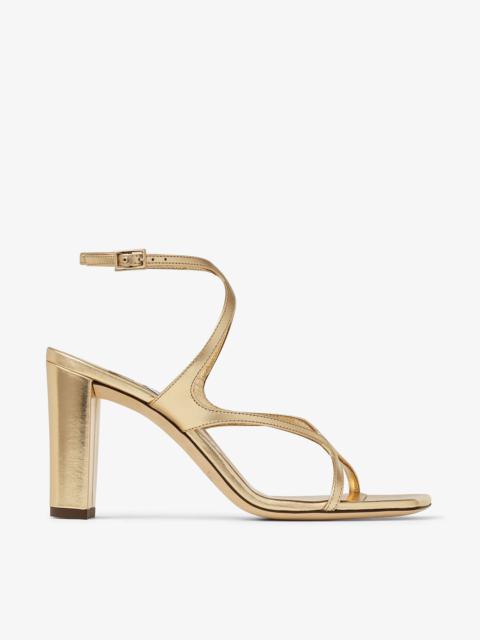 JIMMY CHOO Azie 85
Gold Metallic Nappa Leather Sandals