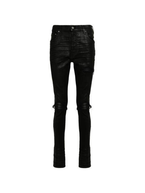 Wax ripped-detailed jeans
