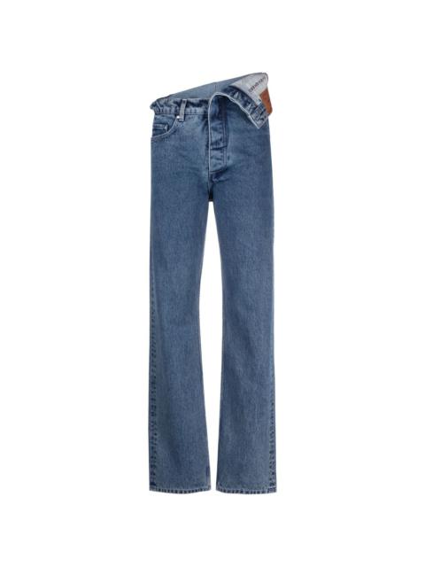 asymmetric-waist jeans