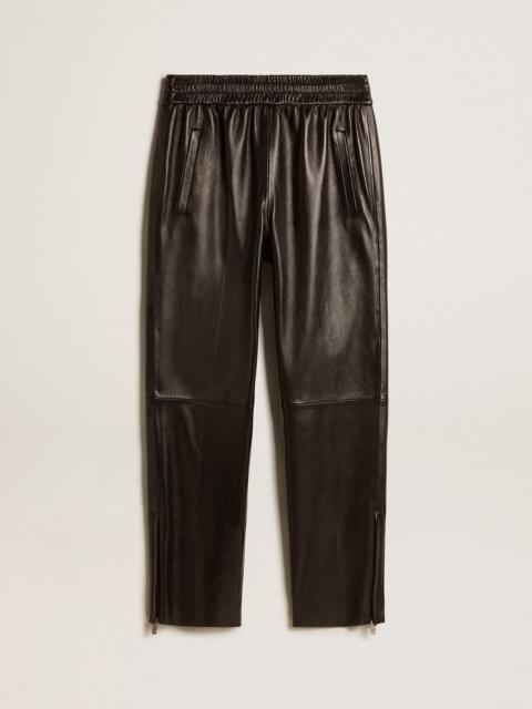Black joggers in nappa leather with zip at the base