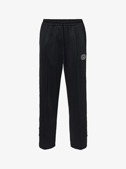 Brand-appliqué relaxed-fit jersey jogging bottoms