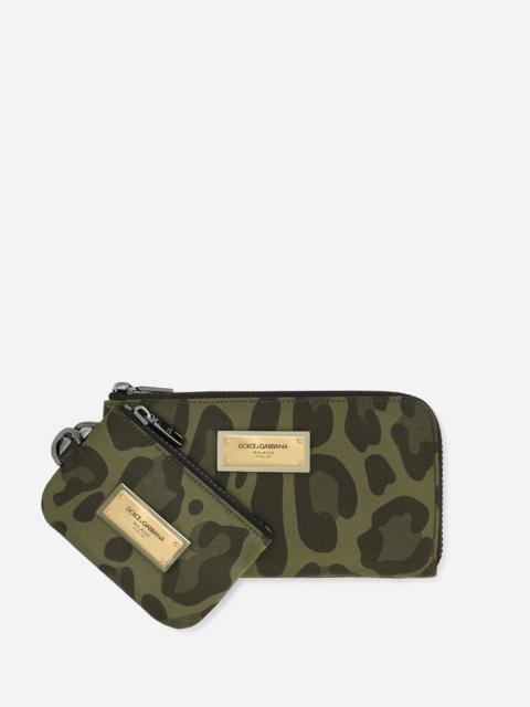 Nylon multi-purpose kit with leopard print against a green background and branded plate