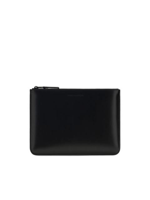 Comme Des Garçons leather wallet