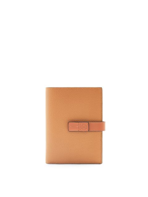 Medium vertical wallet in soft grained calfskin