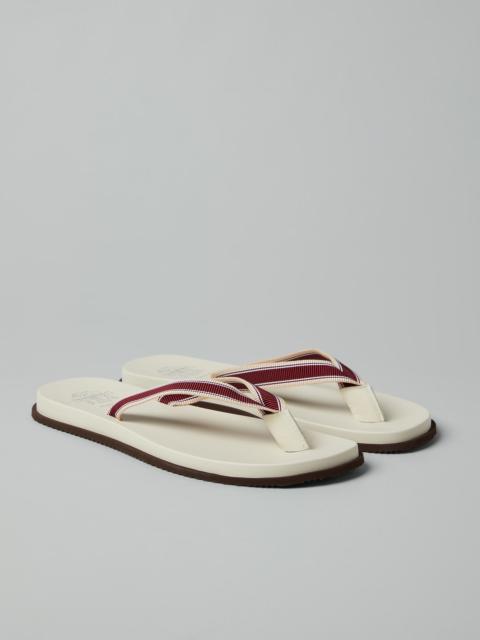 Flip-flops with striped grosgrain band