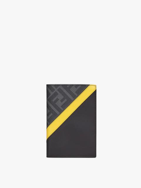 FENDI Passport cover or document holder with interior organized in five card slots. Made of gray textured 